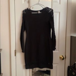 Black bodycon dress with lace detail